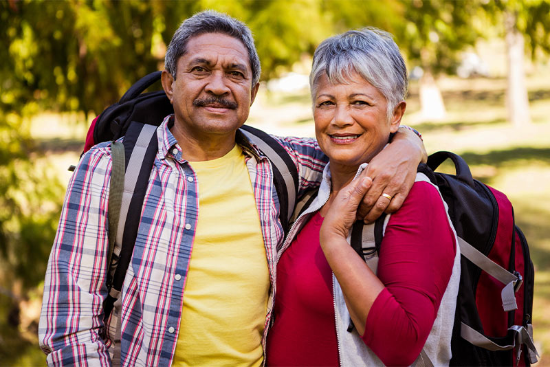 couple with their arms around each other for a picture before they go on a hike simple retirement plan martinez georgia